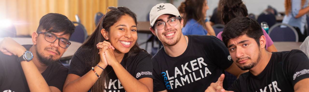 Laker Familia picture of 4 Hispanic students smiling.